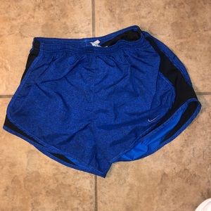 Dark blue nike shorts.